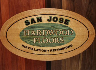 Custom inlay of san jose hardwood floors logo