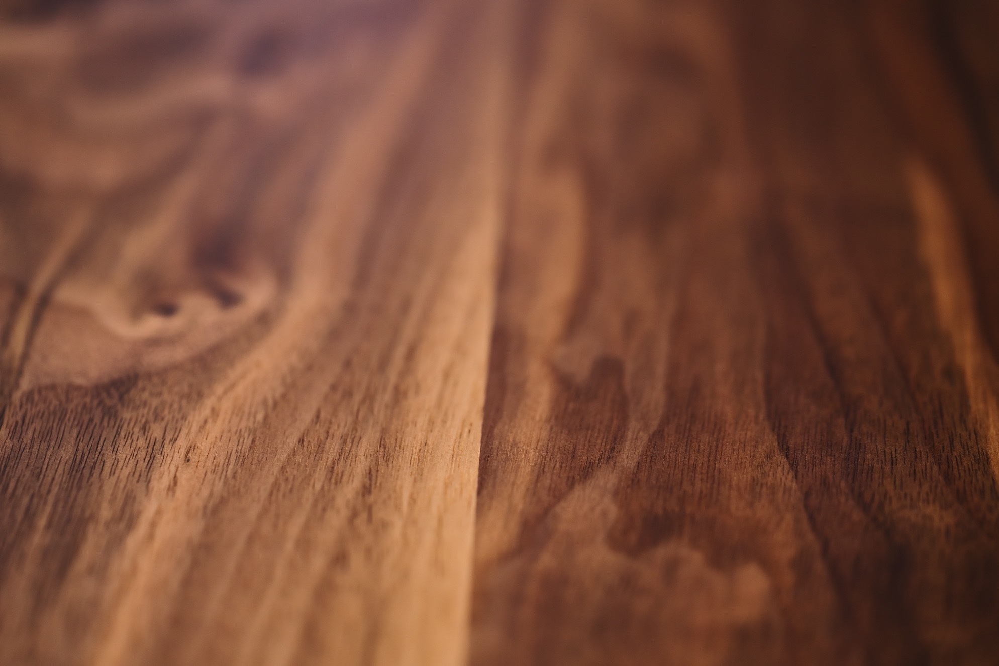 Extreme closeup of hardwood floors showing wood grain and detail