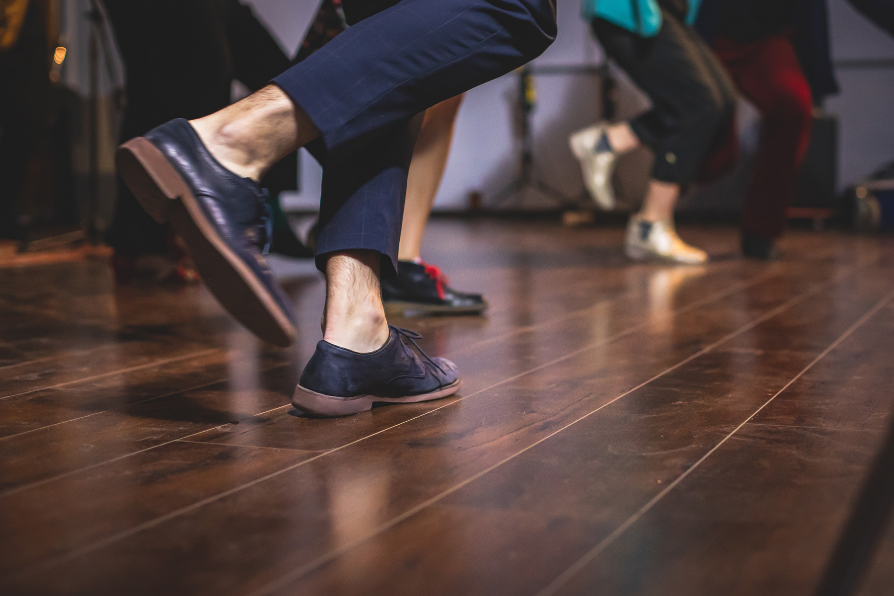 People dancing on a Monarch Plank floor